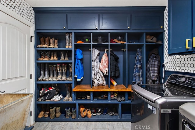 33210 Crown Valley Rd, Temecula, CA 92592 - mudroom featuring separate washer and dryer and wood finished floors