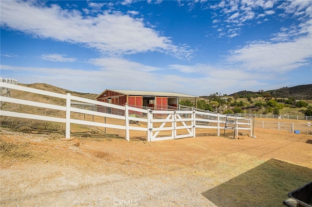 33210 Crown Valley Rd, Temecula, CA 92592 - view of yard featuring an exterior structure, an outbuilding, and a mountain view