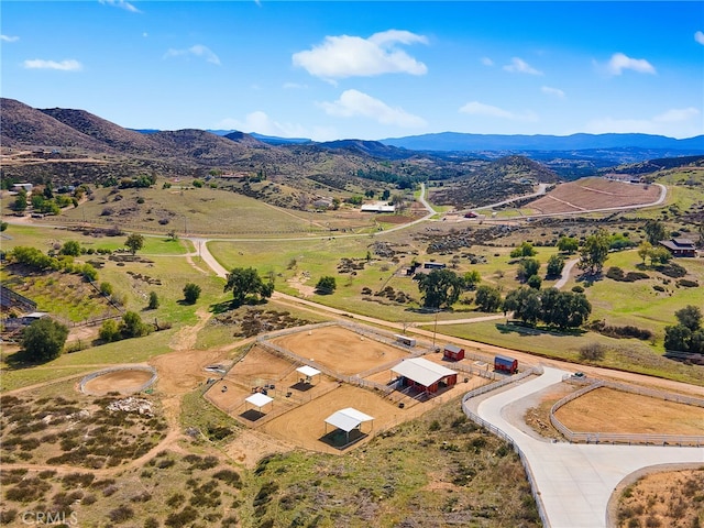 drone / aerial view featuring a rural view and a mountain view