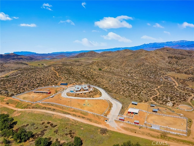 birds eye view of property featuring a mountain view