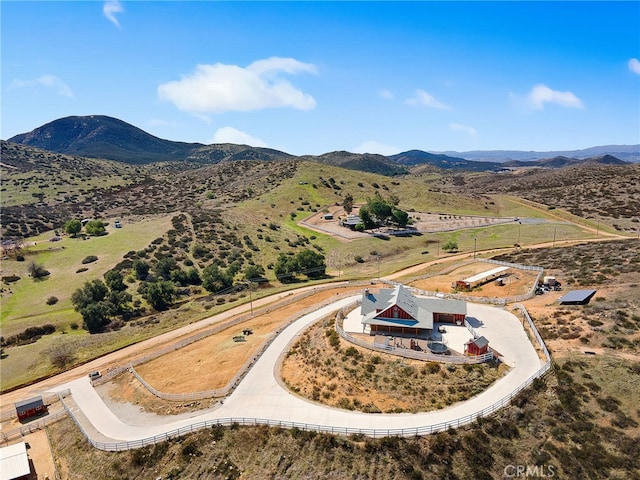 aerial view featuring a mountain view and a rural view