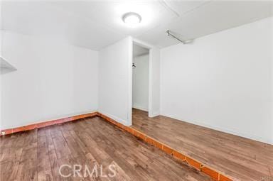 bonus room featuring wood finished floors