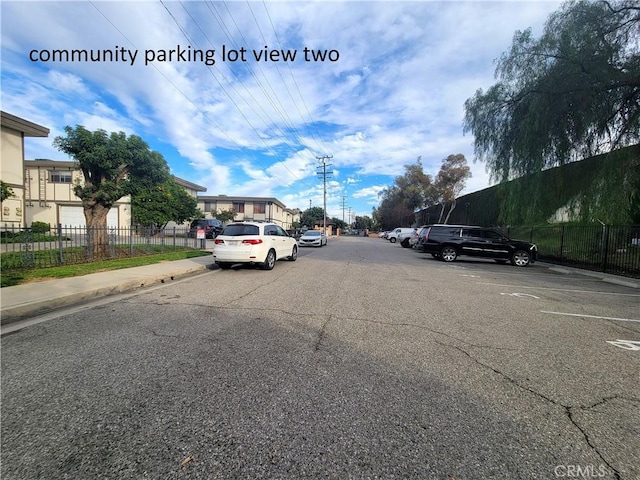 view of road featuring curbs and sidewalks