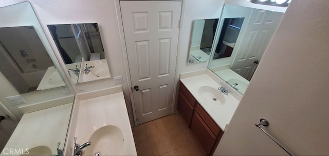 full bathroom with vanity and a washtub