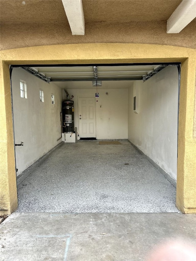 garage with strapped water heater