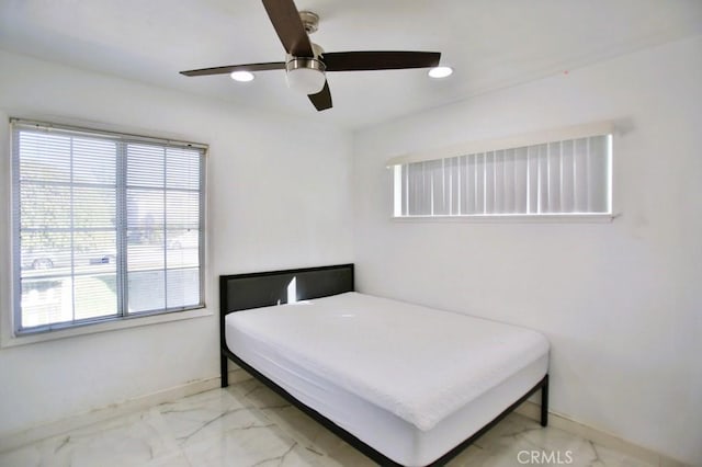 bedroom with ceiling fan, marble finish floor, recessed lighting, and baseboards