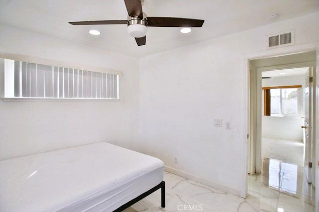 bedroom with marble finish floor, recessed lighting, visible vents, and baseboards