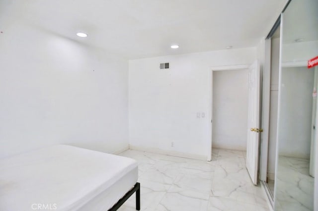 bedroom with recessed lighting, marble finish floor, visible vents, and baseboards