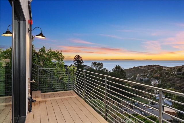 deck at dusk with a water view