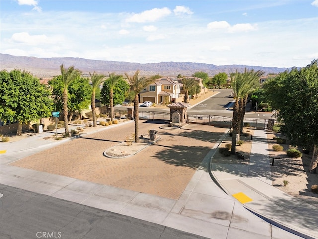 surrounding community with a residential view and a mountain view