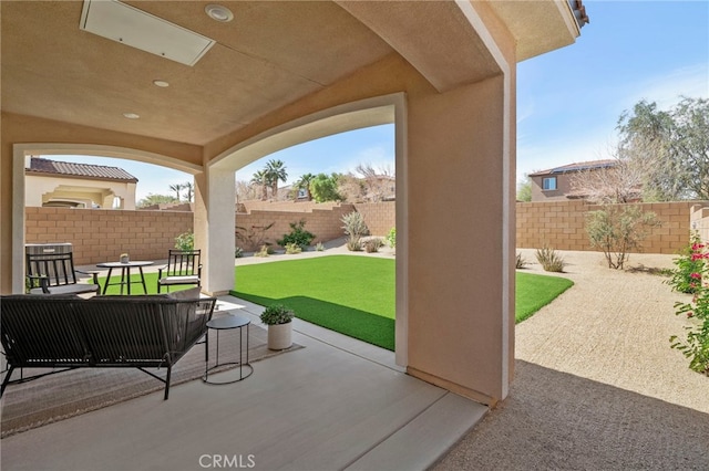 view of patio with a fenced backyard