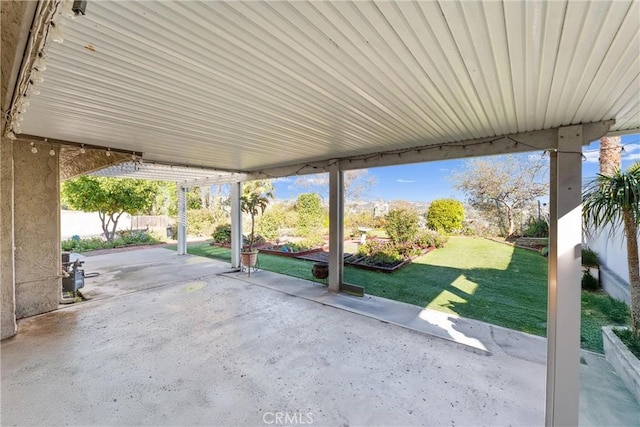 view of patio / terrace featuring fence