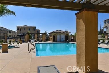 community pool featuring a patio