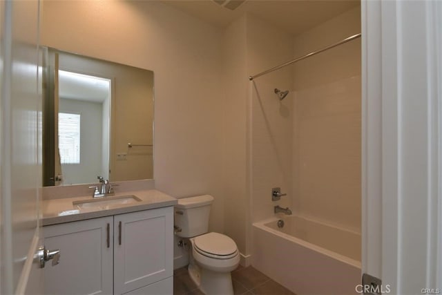 full bathroom featuring toilet, tile patterned flooring, shower / washtub combination, and vanity