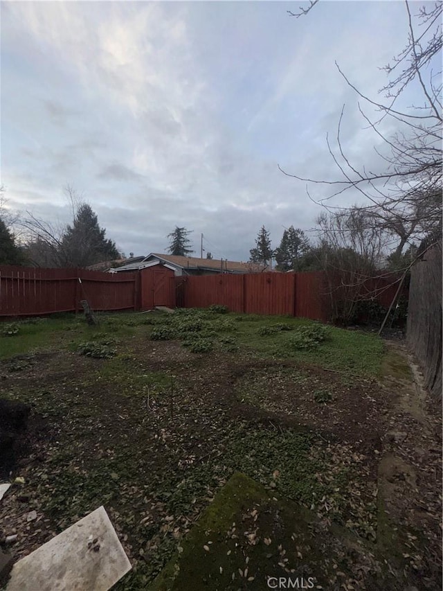 view of yard featuring fence