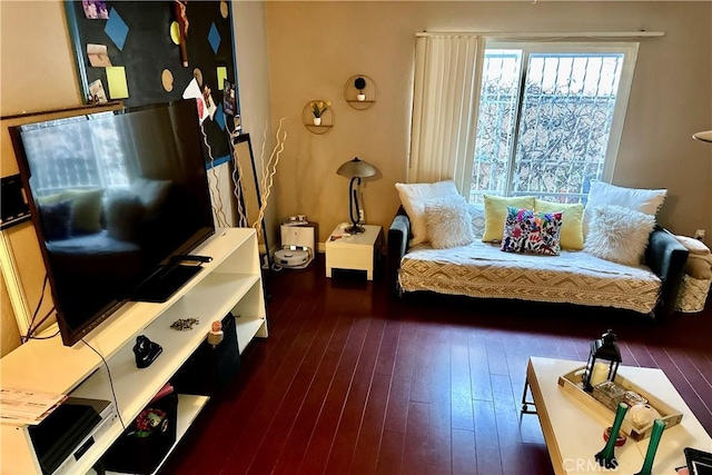 sitting room with hardwood / wood-style floors