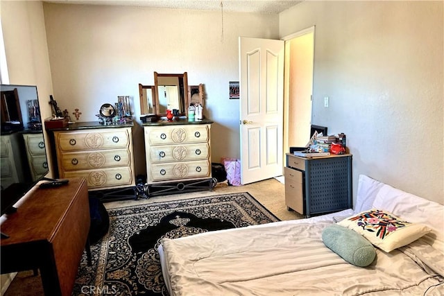 bedroom featuring carpet