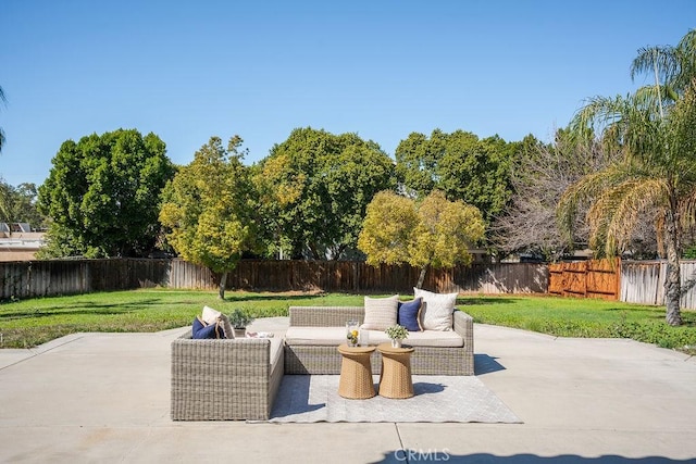 view of patio with a fenced backyard and outdoor lounge area