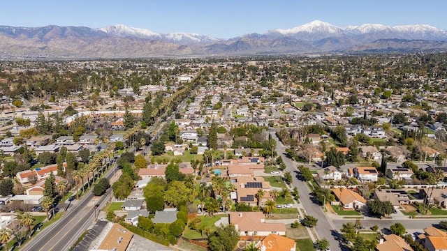 drone / aerial view featuring a mountain view and a residential view