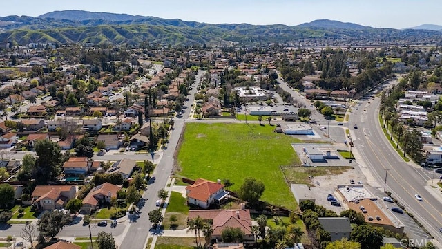 birds eye view of property featuring a residential view and a mountain view