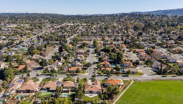 aerial view featuring a mountain view and a residential view