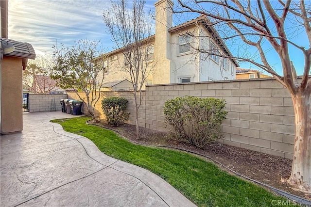 exterior space featuring a patio and a fenced backyard