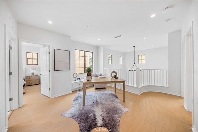 home office featuring recessed lighting, visible vents, and light wood finished floors