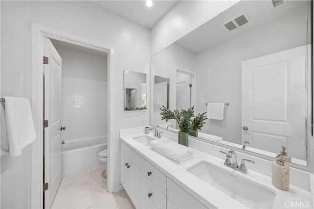 bathroom with marble finish floor, visible vents, a sink, and toilet