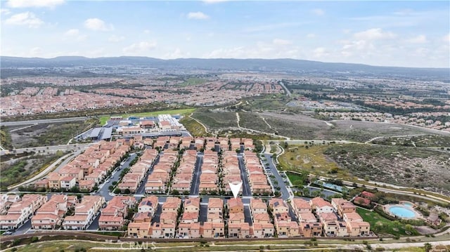 birds eye view of property featuring a residential view and a mountain view