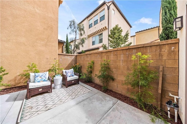 view of patio with fence