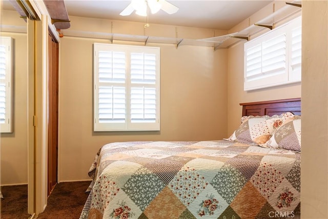 carpeted bedroom featuring a ceiling fan