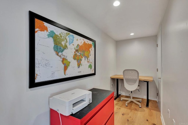 office space with light wood-style flooring, baseboards, and recessed lighting