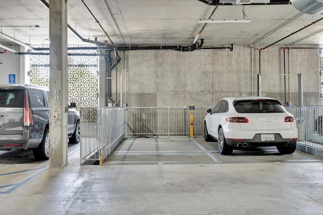 parking deck featuring a garage door opener