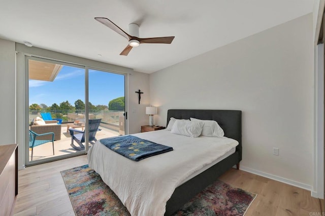 bedroom with a ceiling fan, access to outside, light wood-style flooring, and baseboards