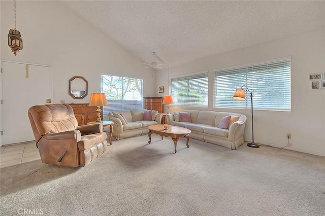 living room featuring a textured ceiling, ceiling fan, light colored carpet, and high vaulted ceiling