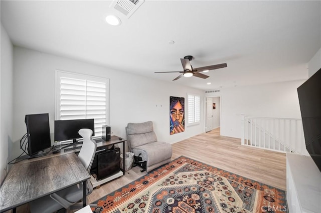 office with ceiling fan, wood finished floors, visible vents, and recessed lighting