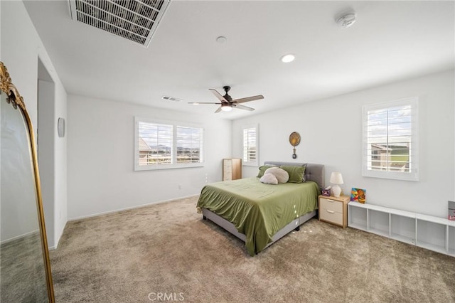 carpeted bedroom with recessed lighting, visible vents, and ceiling fan