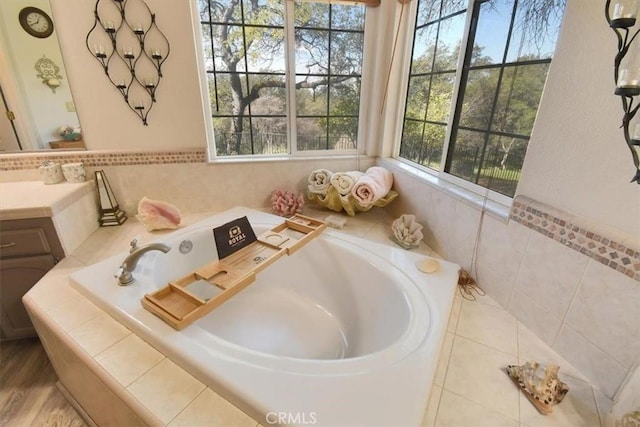 full bathroom featuring a garden tub