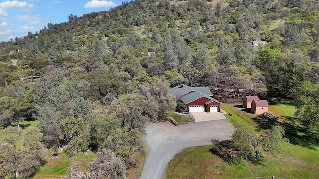 aerial view with a wooded view