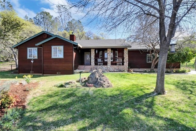 ranch-style home with a porch, crawl space, a front lawn, and a chimney