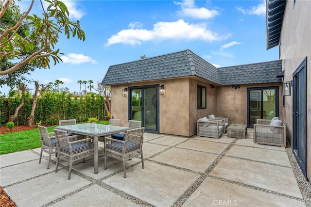 view of patio with outdoor dining space