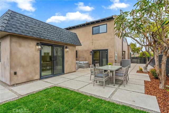 view of patio / terrace with outdoor dining space and fence