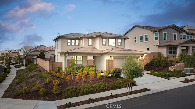 39601 Lupine Dr, Temecula, CA 92591 - view of front facade featuring stucco siding, a garage, a residential view, and driveway