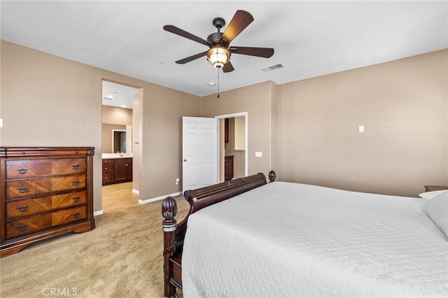 39601 Lupine Dr, Temecula, CA 92591 - bedroom with light colored carpet, baseboards, ensuite bathroom, and a ceiling fan