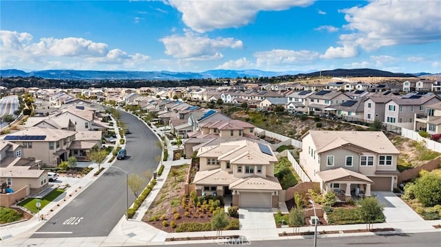 bird's eye view with a mountain view and a residential view