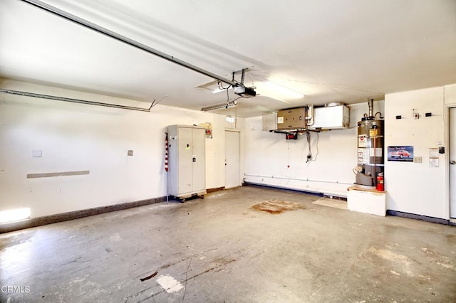 garage featuring water heater, baseboards, and a garage door opener