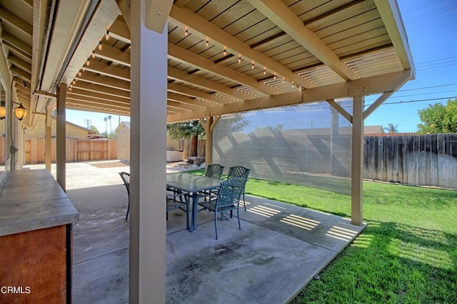 view of patio / terrace featuring outdoor dining area, a fenced backyard, a storage shed, an outdoor structure, and a pergola