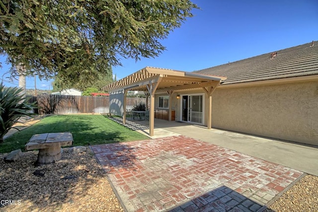 exterior space with a fenced backyard, a tiled roof, a lawn, stucco siding, and a pergola