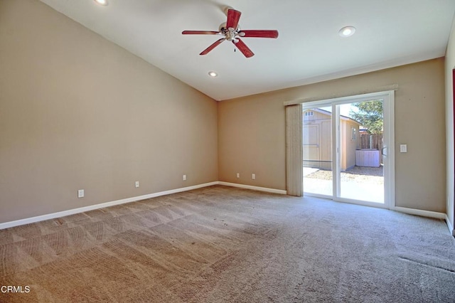 carpeted empty room with ceiling fan, vaulted ceiling, recessed lighting, and baseboards