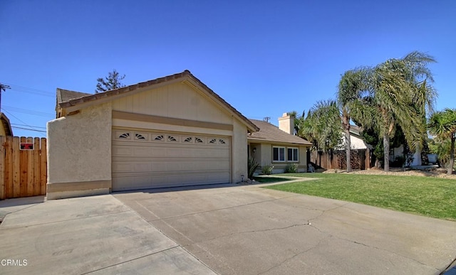 ranch-style home featuring an attached garage, fence, a front lawn, and concrete driveway